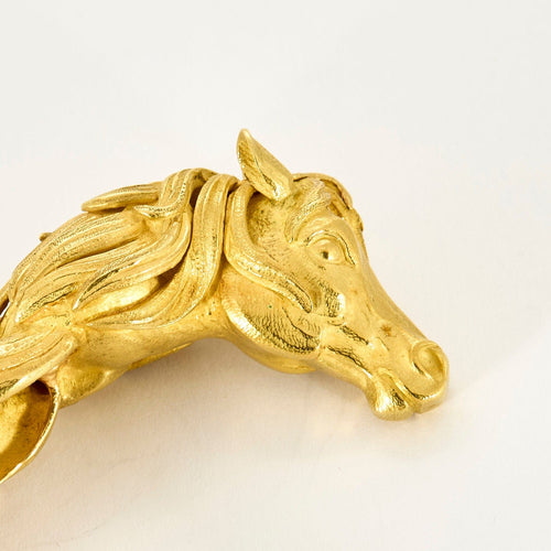 HERMES - Pulseira rígida em ouro amarelo com motivo de cavalo 