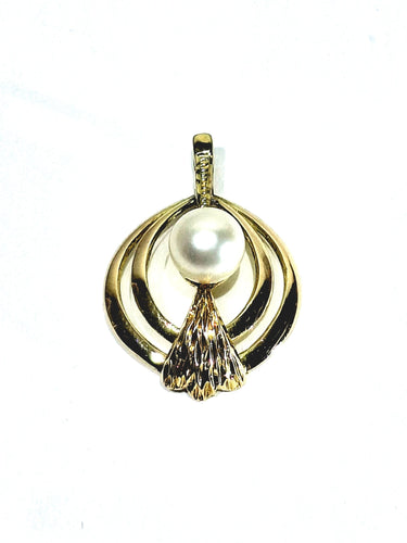 Pendentif Pendentif en or jaune 18 carats et perle 58 Facettes