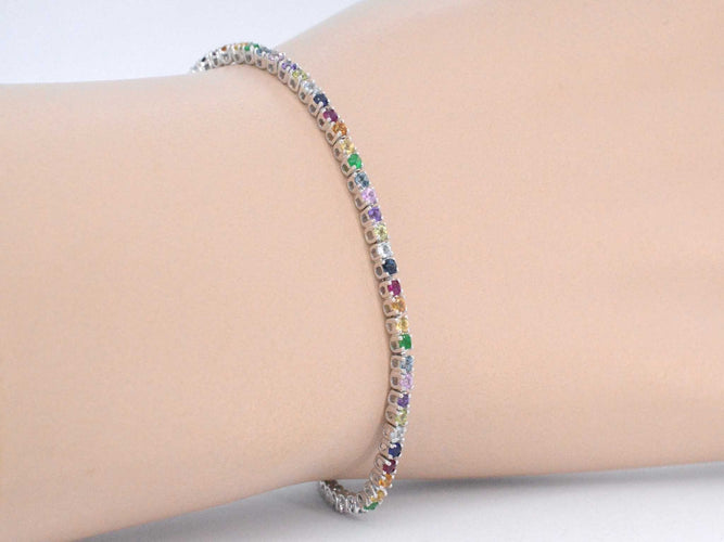 Bracelet Bracelet tennis en or blanc avec pierres précieuses multicolores 58 Facettes 2292