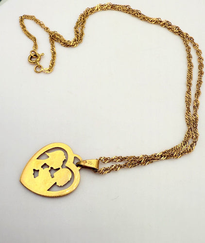 Collier Pendentif amoureux de Peynet et sa chaine en or 58 Facettes