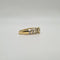 Bague 54 Bague or jaune, diamant rond et diamants baguettes 58 Facettes