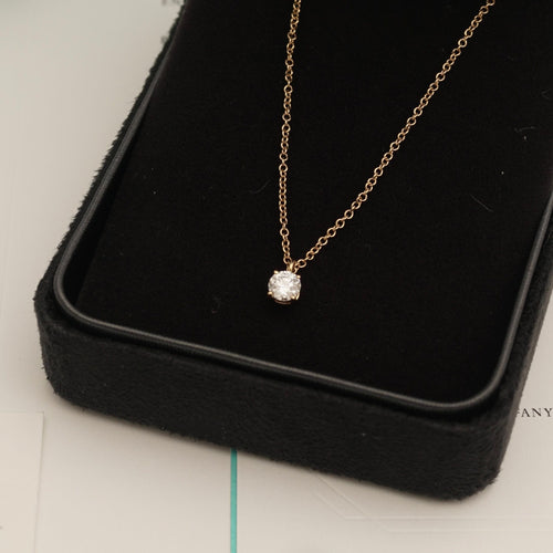 Collier Collier solitaire en or rose Tiffany & Co. 58 Facettes