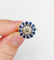 Bague 51.5 Bague marguerite Art Déco or blanc, diamant taille ancienne 0,65 carat et saphirs 58 Facettes A06329