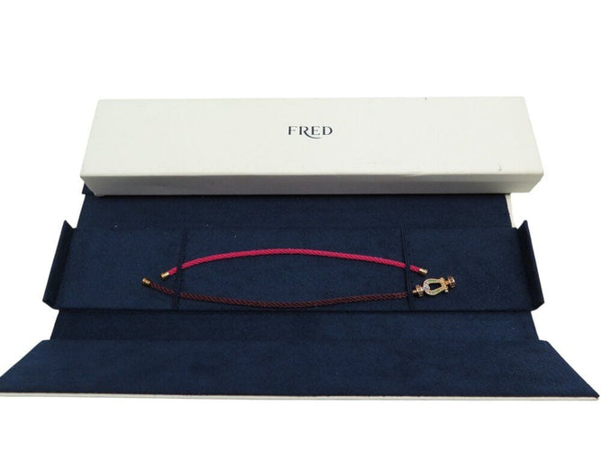 Bracelet bracelet FRED force 10 mm 0b0156 t15 rubis saphir or rose 18 carats 58 Facettes 269168