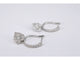 Boucles d'oreilles Boucles d'oreilles en or blanc serties de diamants en forme de cœur 58 Facettes 2174