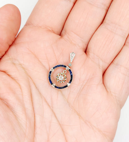 Pendentif Pendentif cible Art Déco or blanc, diamants, saphirs calibrés (circa 1920) 58 Facettes A05269