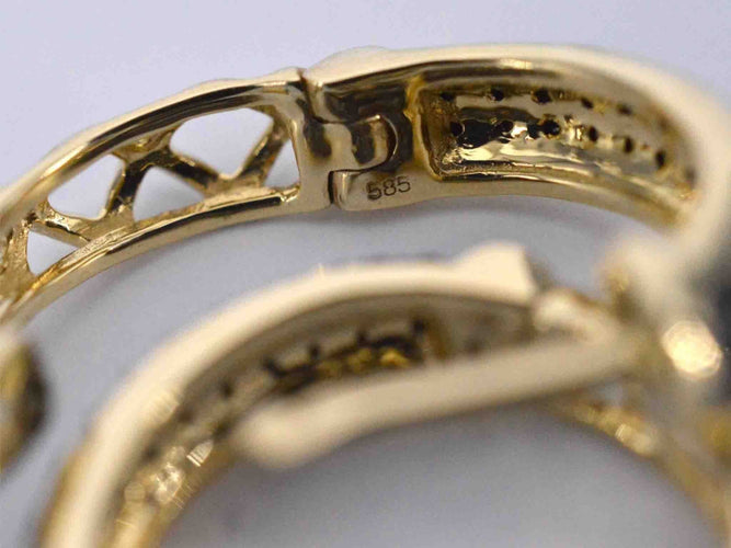 Boucles d'oreilles Boucles d'oreilles en or avec diamant noir 58 Facettes 2228