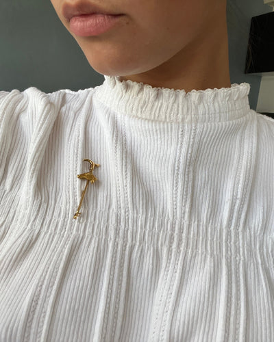 Broche Broche or jaune tête de cheval et fouet 58 Facettes