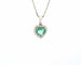 Collier orné d'une émeraude de Zambie de 0,50 carat en forme de cœur et de diamants