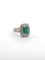 Bague 60 Bague en or blanc massif 18 carats sertie d'une émeraude colombienne et de diamants. 58 Facettes