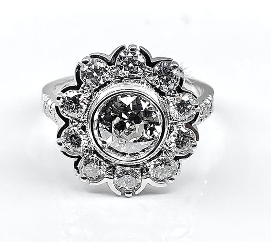 Bague 52 Bague marguerite en or blanc 18 carats : diamant central 1,21 carat 58 Facettes AB333