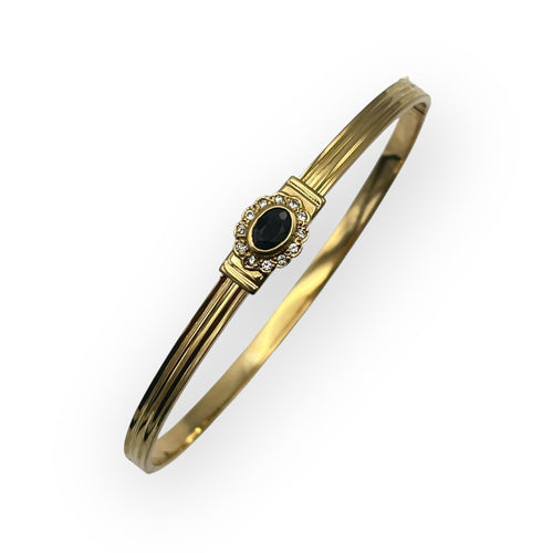 Oval bangle bracelet with opening in 18k yellow gold and sapphire, diamonds 