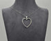 Collier Collier en or blanc 18 carats avec pendentif cœur et diamants naturels de 0,38 carat 58 Facettes 10433