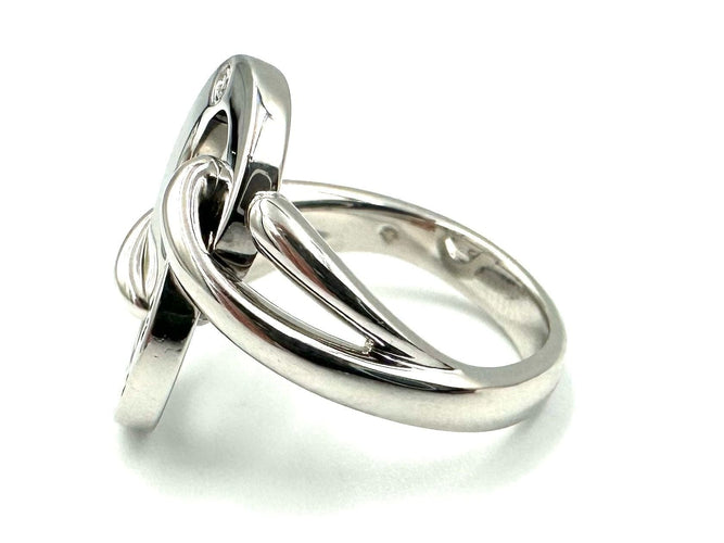 Bague 54 PIAGET. Collection "Possession", bague or blanc 18K et diamant 58 Facettes