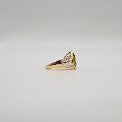 Bague 50 Bague or jaune 18 carats sertie d’un péridot et diamants naturels 58 Facettes