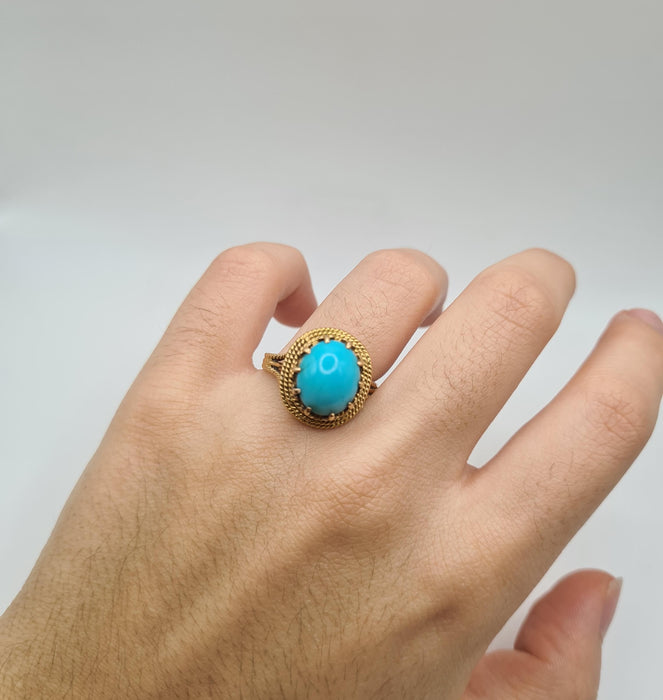 Bague 60 Bague or jaune sertie d’une turquoise 58 Facettes