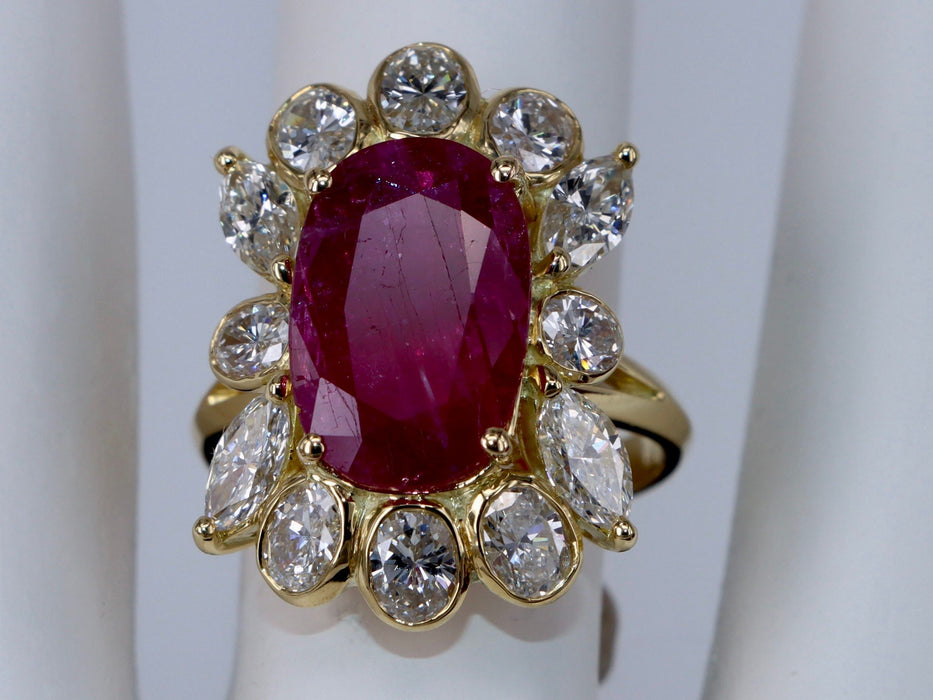 Oval Ruby and Diamond yellow gold ring