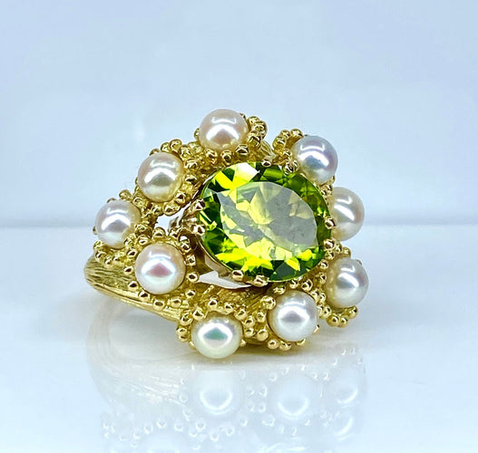 Bague 52 Bague coktail en or jaune 18 carats, péridot 3,98 ct et 9 perles 58 Facettes AB571