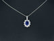 White gold entourage pendant with diamonds and sapphire 58 Facettes 2299