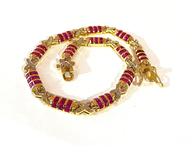 Bracelet Bracelet en or jaune, rubis calibrés et diamants 58 Facettes AB620