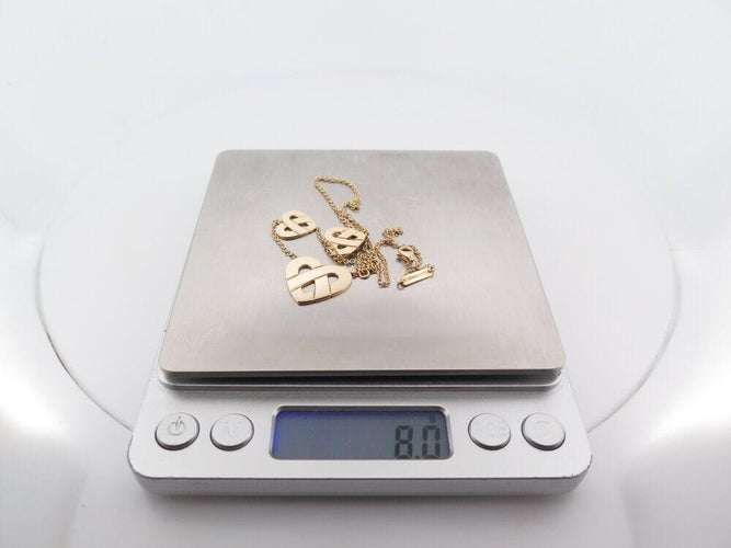 Collier collier POIRAY coeur entrelace multi 37 42cm en or jaune 18k 58 Facettes 265095