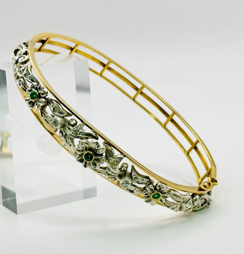 Bracelet Bracelet en or jaune orné de motifs floraux en argent, émeraudes et diamants 58 Facettes 50319