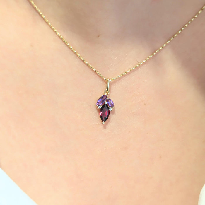 Yellow gold, diamond, amethyst, garnet necklace