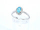 Bague Bague en or blanc avec une topaze bleue et des diamants naturels 58 Facettes 2367