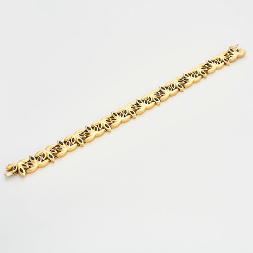 Bracelet CHAUMET - Bracelet or jaune orné de saphirs 58 Facettes GU8