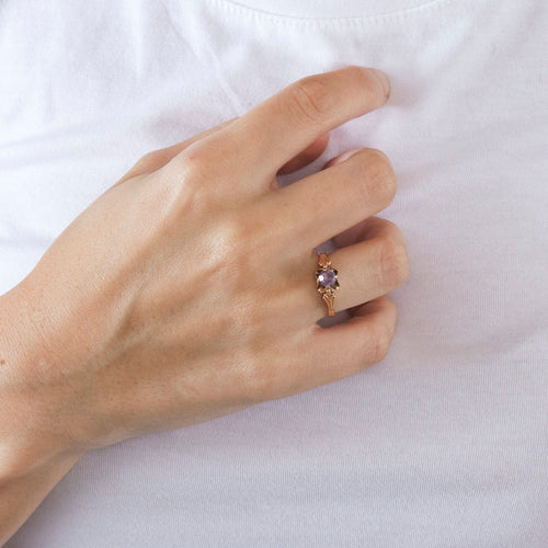 Bague Bague solitaire or rose saphir violet 58 Facettes LP703