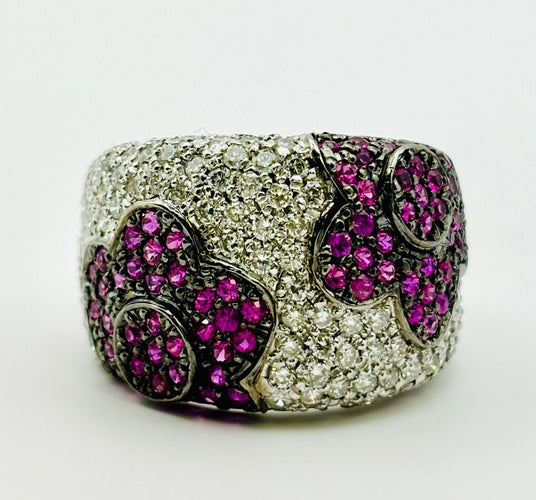 Bague Bague en or ornée de motifs floraux composés de diamants et de rubis 58 Facettes 50166