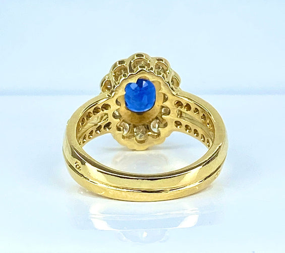 Bague 52 Bague marguerite en or jaune 18 carats, saphir et diamants 58 Facettes AB494