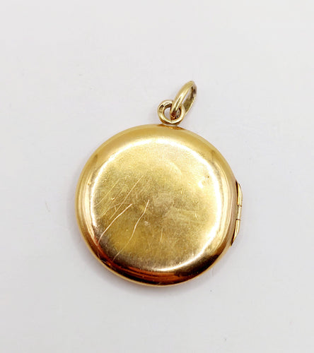 Pendentif Pendentif porte-photo antique fleur en or 18k avec diamant et rubis vers 1910 58 Facettes A06431