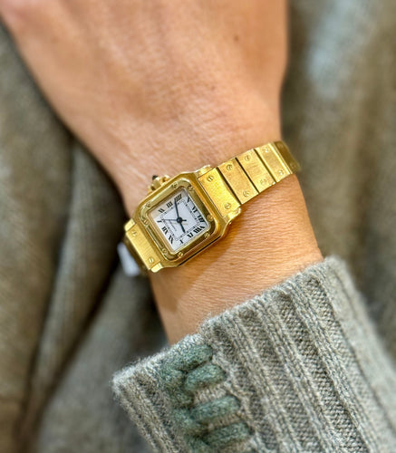 Montre Montre femme Cartier Santos galbée en or 58 Facettes