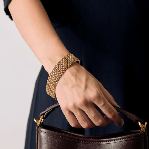 Bracelet Bracelet ruban en or jaune 58 Facettes CLA0530