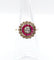 Bague 48 Bague fleur art deco or rose 18k ornée d'un diamant taille brillant entouré de rubis calibrés dans une monture finement travaillée (circa 1920) 58 Facettes A04432