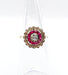 Bague 48 Bague cible Art Déco or rose, diamant, rubis calibrés (circa 1920) 58 Facettes A04432