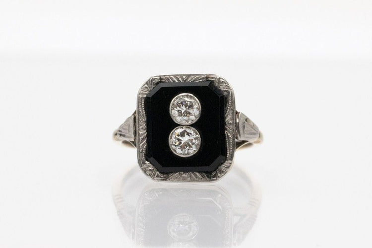 Bague 56 Bague Art Déco, onyx et diamants env. 0,40 ct, 1930 58 Facettes 11496
