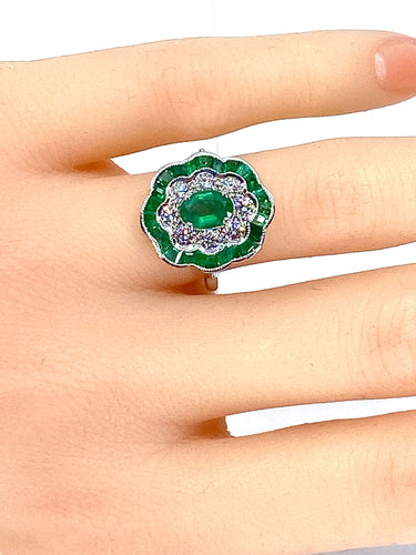 Bague Bague marguerite en or blanc 18 carats en émeraudes et diamants 58 Facettes AB216