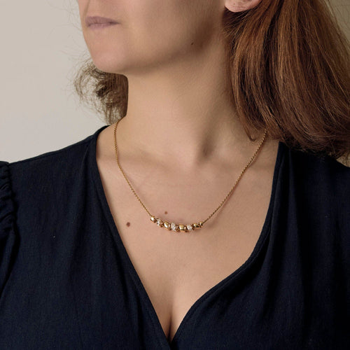 Pendentif Pendentif moderniste en or jaune et diamants 58 Facettes RAM3335