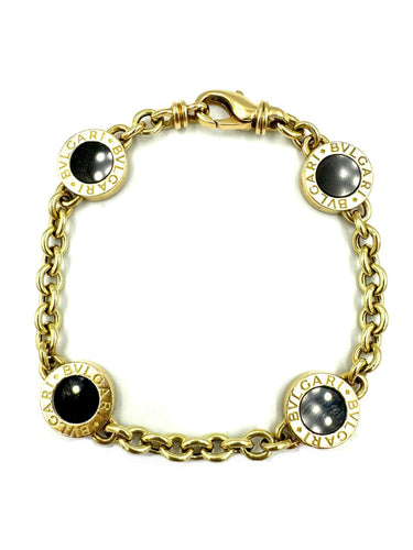 Bracelet BVLGARI. Collection "BVLGARI-BVLGARI", bracelet or jaune et onyx 58 Facettes