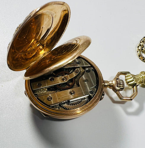 Montre Montre de col émaillé et sa chaîne en or jaune 58 Facettes 226