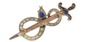 Broche Broche antique en or, diamant et saphir, serpent enroulé autour d'une épée ou d'un poignard 58 Facettes 22297-0136