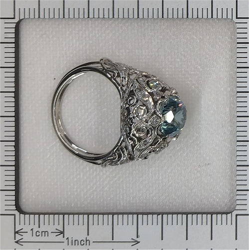 Bague 53 Bague vintage en platine avec zircon bleu – Élégance du milieu du siècle dans un design ajouré 58 Facettes 25115-0283