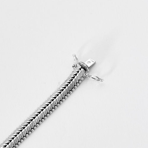 Bracelet Bracelet années 60, or blanc et diamants 58 Facettes GULK202