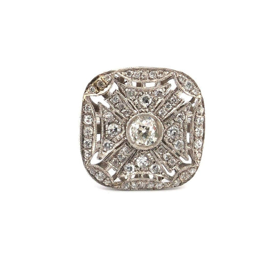 Bague 56 Bague en platine avec diamant central et diamants environnants 58 Facettes