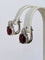 Boucles d'oreilles Boucles d'oreilles puces exquises en or blanc, serties d'un rubis rouge de 4,32 carats et de diamants 58 Facettes