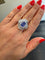 Bague 56 Bague Jupe Or blanc - Tanzanite et Diamants - Année 70 58 Facettes 1.0002595/1