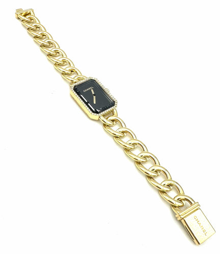 Montre CHANEL. Collection "Première chaine gourmette", montre en or jaune 18K 58 Facettes