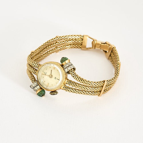 Montre Montre ancienne UTI en or jaune 58 Facettes